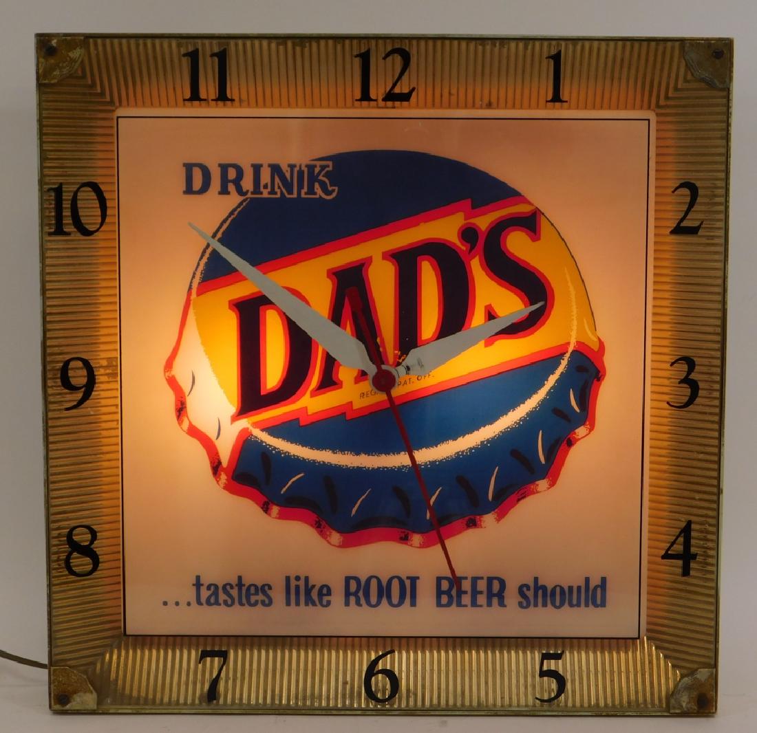 Vintage Dad's Root Beer Advertising Wall Clock: United States,20th CenturyAdvertising Products Inc. square face clock reading "Dad's tastes like ROOT BEER should".Metal and glass,16" x 16",From the collection of Russell Buteau, Millville, Massachus