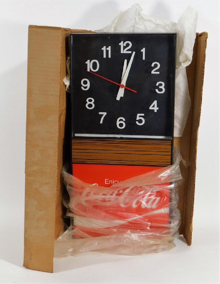 Enjoy Coca-Cola Electric Advertising Clock Sign: United States,20th Century In original box. Plastic,21" x 10", From the collection of Russell Buteau, Millville, Massachusetts. Life long collector of Coca-Cola and antiques for over 40 years.