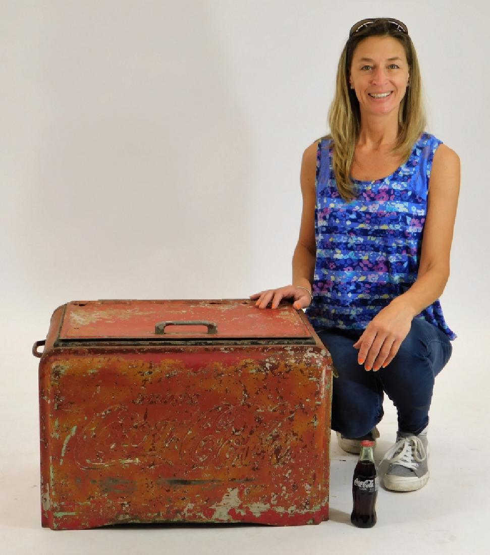 Vintage Drink Coca-Cola Ice Cold Red Cooler: United States,20th Century Vintage small Drink Coca-Cola Ice Cold red cooler. Metal,27"long x 17"deep x 17" tall, From the collection of Russell Buteau, Millville, Massachusetts. Life long collector o
