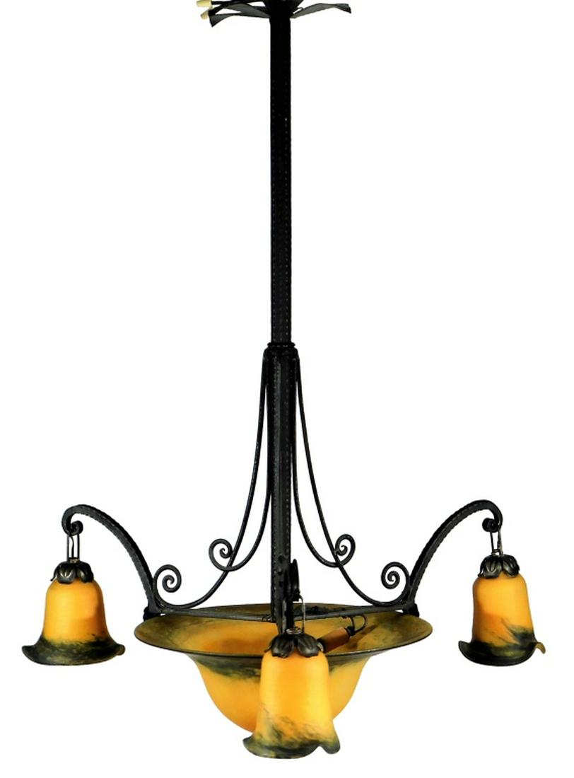 Art Nouveau Muller Freres Art Glass Chandelier: ,France,20th Century Three arms, four bulbs with black and orange striated art glass shades. Attributed to Muller Freres, Luneville, France. Iron, glass,36" tall x 23" wide, From the estate of a Woods
