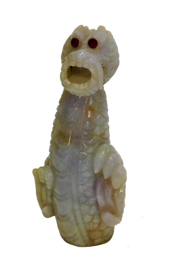 Chinese Qing Dynasty Carved Jadeite Dragon Figure: ,China,Qing Dynasty Pale variegated lavender and green jadeite dragon with fierce expression and inset natural ruby eyes. Jadeite,4 1/2" x 2", From the collection of a Great Neck, New York woman.