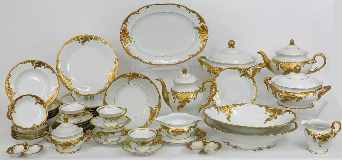 50PC Wawel White & Gold Porcelain Dinner Service: ,Poland,Circa 1950 Service includes four teacups, teapot, coffee pot, creamer, sugar bowl, two double butter pats dishes, six saucers, six dinner bowls, gravy dish, six dinner plates, six berry bowls,