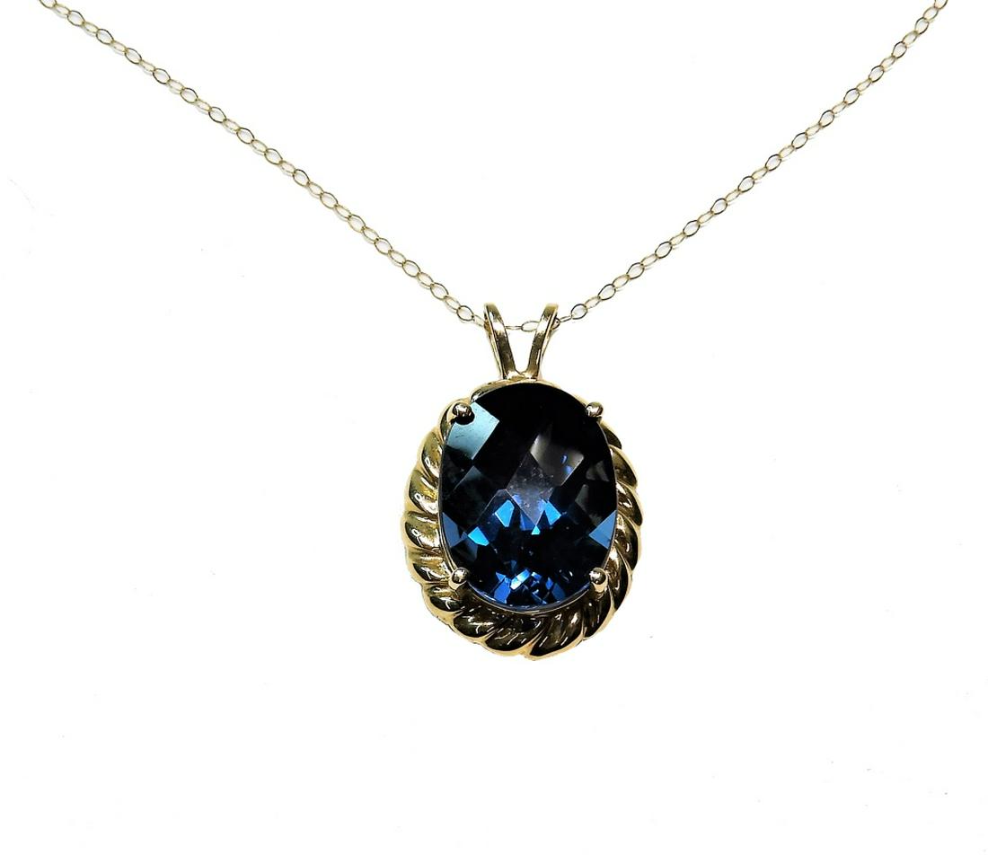 10K Yellow Gold Oval Spinel Solitaire Necklace: ,China,20th Century Brilliant blue oval cut solitaire spinel stone in 10K yellow gold rope twist setting and link chain. Weight as seen 5.2 grams. 10K gold, spinel,18" Chain,Center stone 16mm x 12mm F