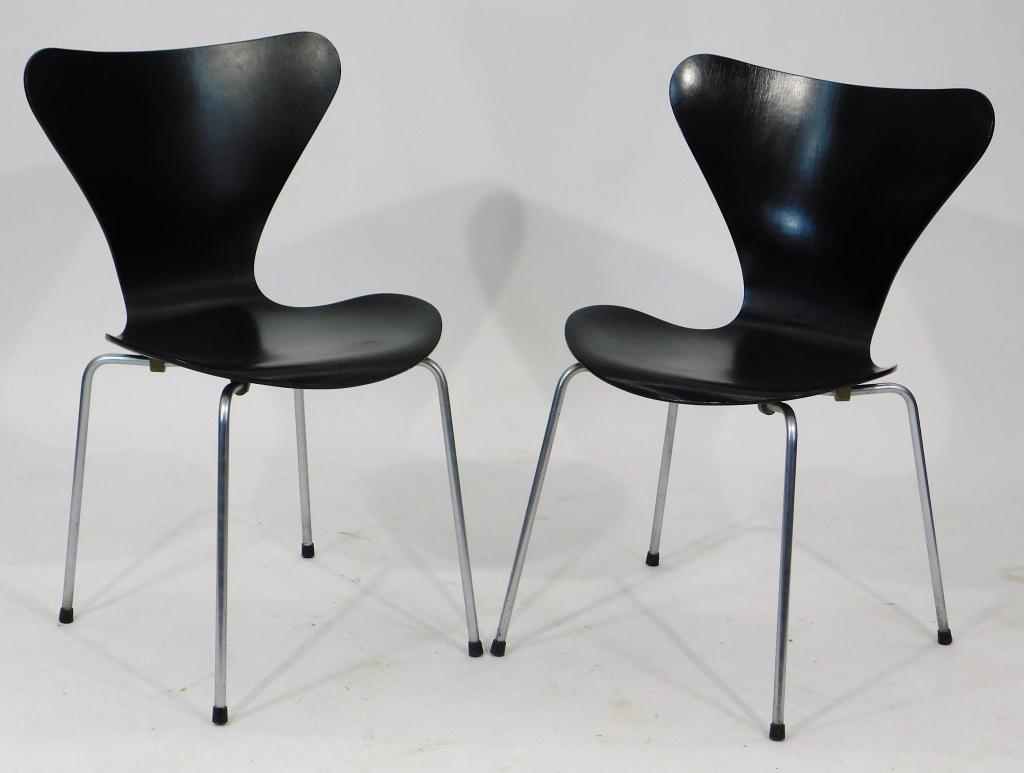 Pair Fritz Hansen MCM Black Laminate Basket Chairs: Denmark,20th Century Pair of shapely basket chairs chairs supported by four simple metal legs. Marked "Made in Denmark" on the bottom. From the collection of a Cranston, Rhode Island gentleman. Wood,