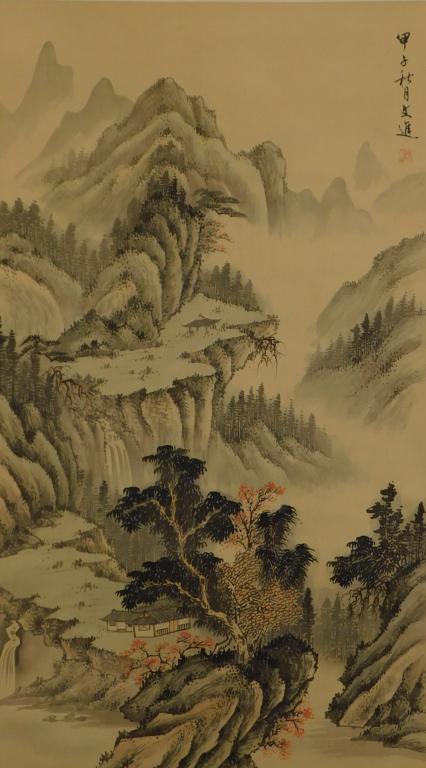 Japanese Calligraphy Landscape Hanging Wall Scroll: Japan, Misty mountains dotted with buildings and trees underneath a banner of calligraphy. Image contains a line of calligraphy and a collector's mark to the upper right. Ink, paper, silk Overall 88"