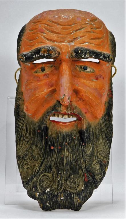 Latin American Carved Wood Parade Mask: Mexico, Latin America,20th Century Polychrome mask of a balding man with a long black beard, possibly a Guatemalan conquistador mask that would be worn during religious parades with a suit of armor on