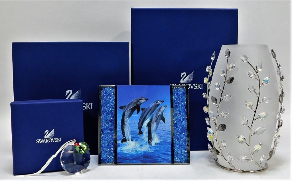 3PC Swarovski Crystal Home Decor Grouping: Austria,Circa 2000 Lot includes one 0870003 Holly Window Ornament, one 660733 Leaves Vase, and one 686555 Blue Starlet Frame. Synthetic hardstone,Smallest 2" dia.,Largest 8" x 4" dia. From the collect