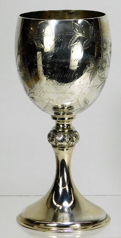 19C Wood and Hughes S. S. Seminole Silver Cup: United States, New York,Late 19th Century Decorated with flowers, inscription reads "Capt. J. Robinson of S. S. Seminole. A Token of Appreciation Aug 23/93 From Passengers." Weight as seen 9.5 ozt. St