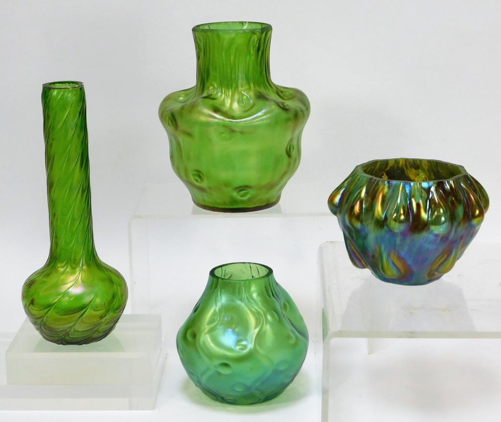 4 Various Green Bohemian Czech Art Glass Vases: Bohemia,20th Century Lot includes one Loetz rusticana squat vase, one Loetz squat vase, one Kralik draped bud vase, and one Kralik moss agate squat vase.Glass,Smallest 3" x 4" dia.,Largest 7 1/4" x 3"