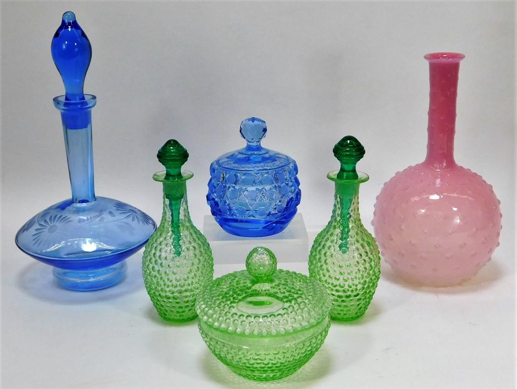 6 Attr. Palda Bohemian Art Glass Table Accessories: Bohemia,20th Century Lot includes one pink long neck vase, one blue glass decanter decorated with etched flowers, one blue cut glass lidded jar, one green covered jar, and a pair of green perfume bott