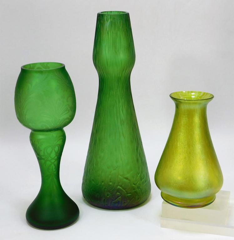 3 Attr. Loetz Bohemian Czech Art Glass Vases: Bohemia,20th Century Lot includes one large rusticana style vase, one yellow papillon style vase, and one deco hyacinth vase with etched flowers.Glass,Smallest 7" x 4" dia.,Largest 13 1/4" dia.From th