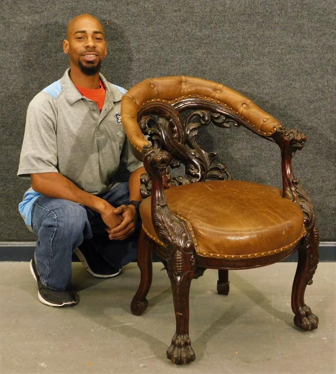 Continental Carved Gargoyle Wood Library Arm Chair: ,19th Century Continuous arm chair with pierced dolphin carved back rest and decorated with acanthus leaves with arm terminating in gargoyles and finely carved acanthus leaf knees over lion claw feet,