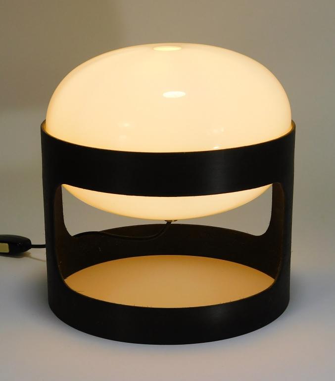 Black KD27 Table Lamp by Joe Colombo for Kartell: Joe ColumboItaly,1967 Black plastic base with plastic removable squat egg like shade.Lucite, composite wood,10" x 9 1/2",From the collection of a Silverspring, Maryland lady.