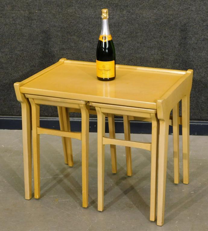 3PC Brandt Blonde Wood Nesting Table and Stools: United States,20th Century Square top over four simple carved legs over two smaller square top stools in a matching style. Wood,Table 23" t x 27" w x 18 1.2" d,Stool 20 1/5" t x 15 1/2" w x 12" d Mark