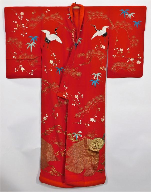 Edo Period Embroidered Cranes Uchikake Kimono: Japan,Circa 1840 Hand woven red silk crepe kimono with beautifully rendered hand embroidered cranes and foliage, gold thread accents, and gold couching. 49 1/4" wingspan x 24" body x 62" length Silk, 