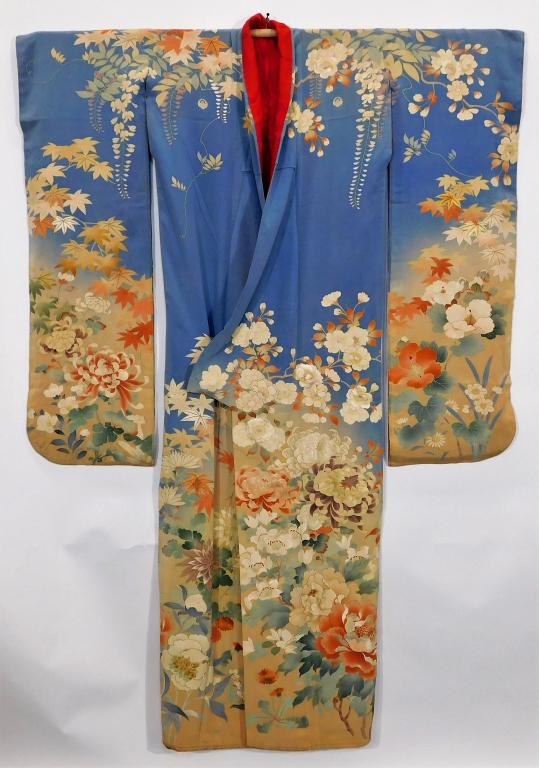 Meiji Period Yuzen Hand Painted Furisode Kimono: Japan,Circa 1890 Hand woven light blue silk crepe five crested kimono decorated with yuzen hand painted dye flowers rendered with multiple tones and depth accentuated by embroidery. Lined with a strik