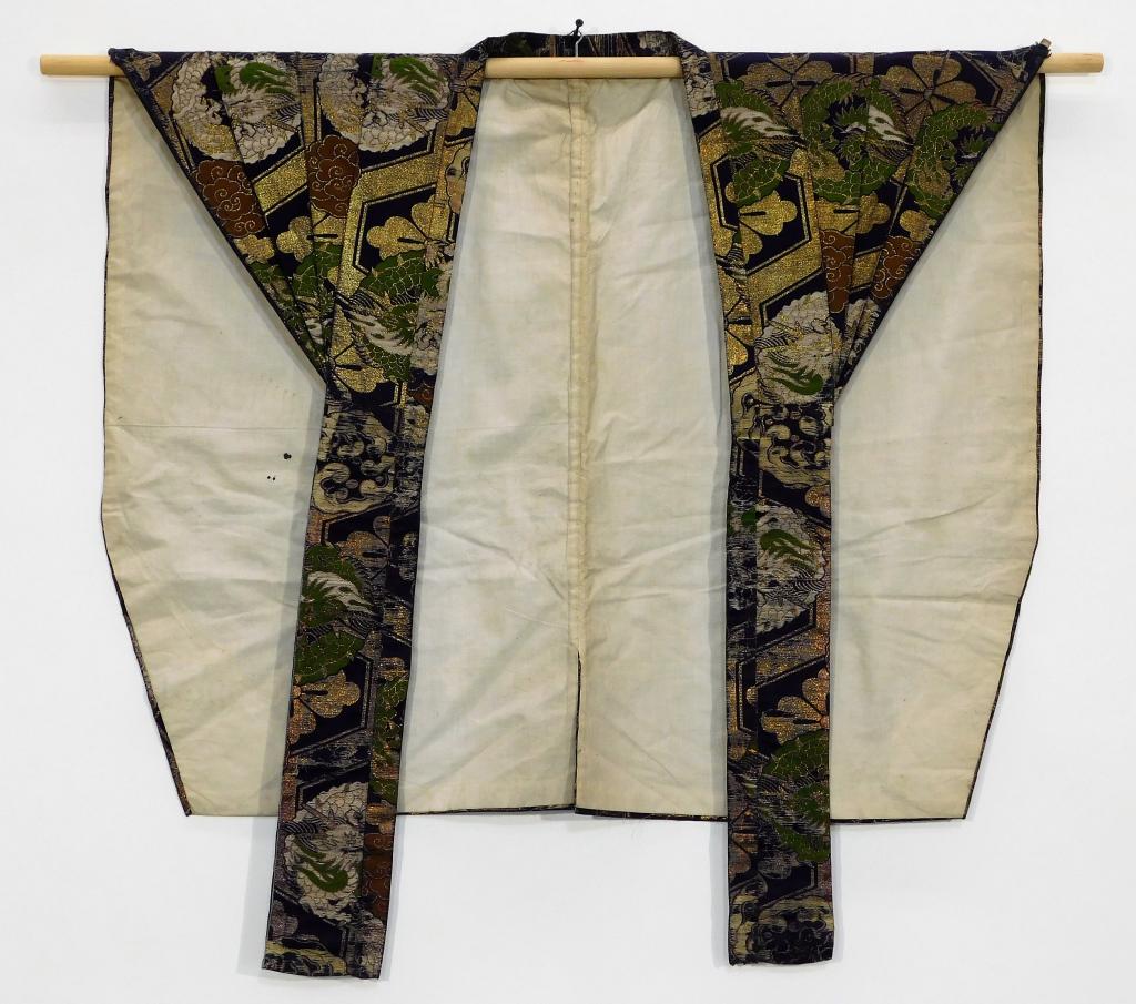 C.1810 Japanese Edo Period Kataginu Samurai Top: Japan,Circa 1810 Hand woven navy blue brocade top decorated with dragons, clouds, and gold threading. Silk,28 1/2" x 35 1/2", Immaculate museum quality kimono from one of the largest private collectio