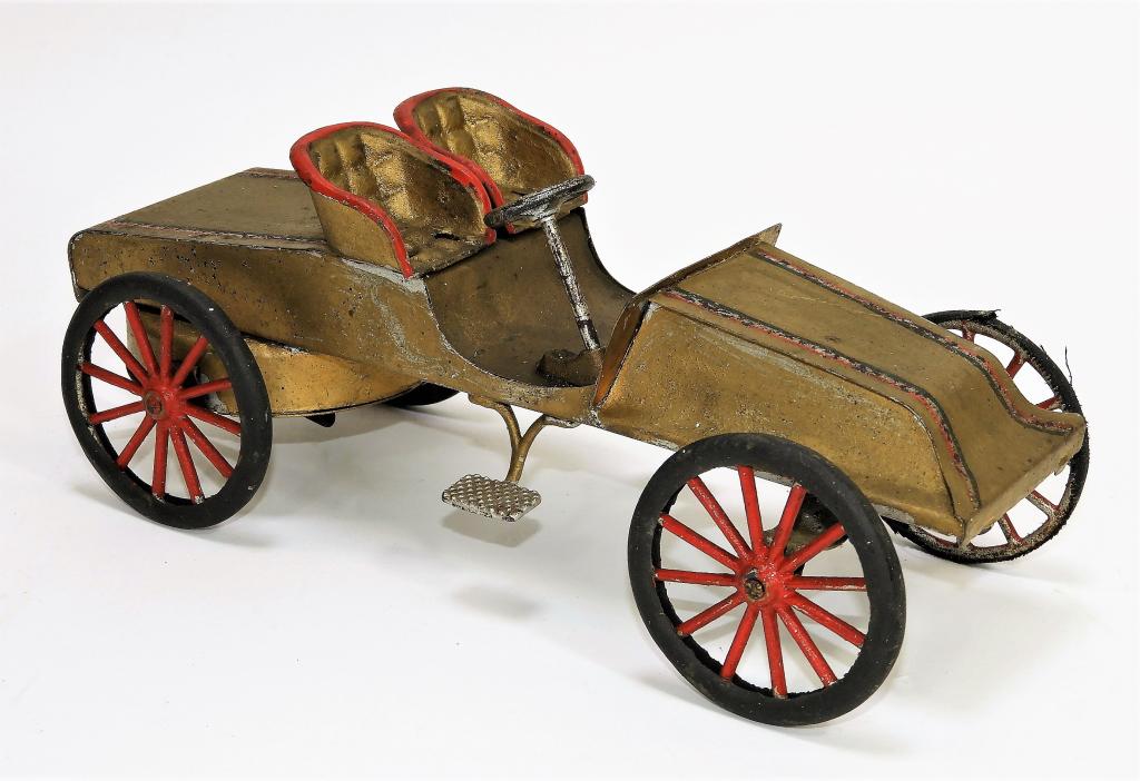 Antique Tin Litho Wind Up Toy Car: United States,Early 20th Century Played with, wear, minor losses to paint, painted in gold with red, green, and silver accents, light oxidation. Tin litho,4" t x 4 1/4" w x 9 3/4" d, From the collecti