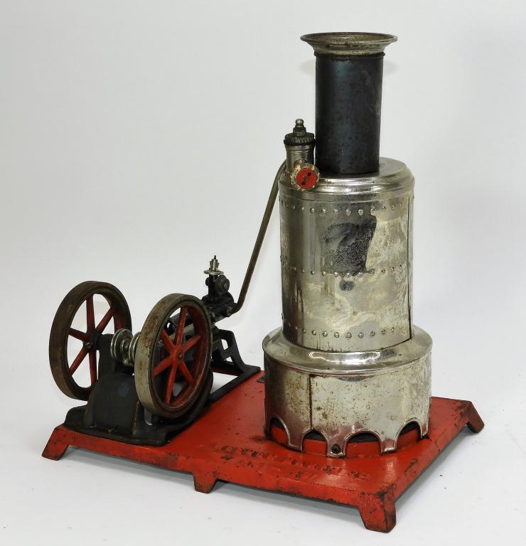 Antique Weeden No. 49 Model Steam Powered Engine: Massachusetts,1898-1926 Single boiler mounted on a red painted base with light wear and losses to base and light oxidation throughout. The Smithsonian National Museum of American History has a Model 4
