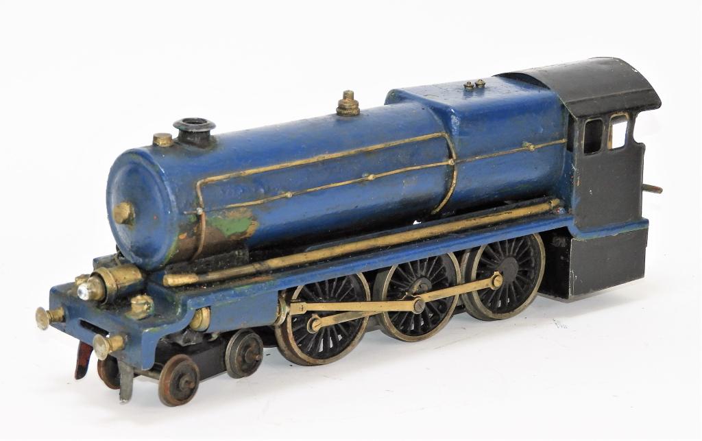 EARLY American Antique Blue Model Train Car: United States,20th Century Retains most of its original paint, pistons appear to be in good condition, front of train with mounted light with light oxidation and wear around body. O gauge, displays we