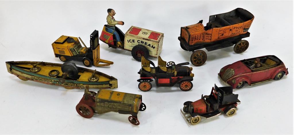 8PC Antique Marx Linemar CKO Tin Toy Group: Germany, Japan, United States,Early 20th Century Includes one tractor, one red truck, one weight driven boat, one Courtland ice cream truck, one CKO red car, one Linemar forklift, one Louis Marx & Co.