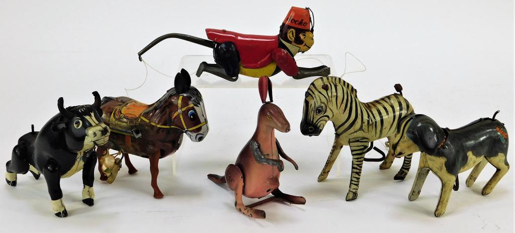 6PC Japanese Linemar Animal Tin Toy Group: Japan,20th Century Includes one wind up dog with stuck key, one wind up Walt Disney Linemar bull in working condition, one wind up zebra that occasionally works, one wind up donkey in working conditio