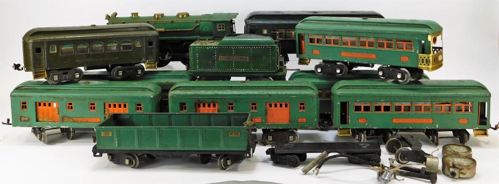 11 Antique Lionel Pre War Train Cars: United States,Early 20th Century Includes one dark green No. 610, one dark green pullman car, two No. 339, two No.341, two No. 332, one No. 392-T, one No. 512, and one No.390E electric locomotive, all
