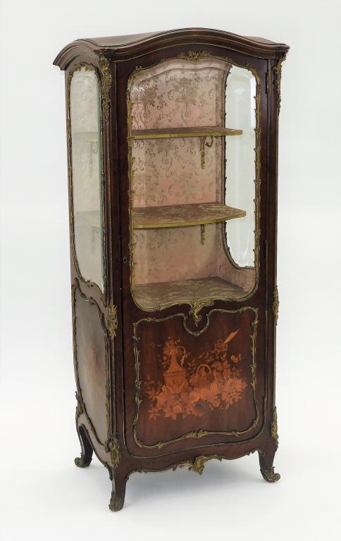 French Bronze Mounted Marquetry Vitrine Cabinet: France,Circa 1900 Shapely cabinet with center botanical and pomological marquetry inlay with floral spray side panels, fully mounted with bronze ormolu acanthus leaf hardware, retains original key. Fr