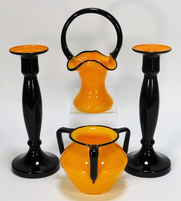 4PC Assorted Orange Tango Bohemian Art Glass Vases: Bohemia,Early 20th Century Lot includes a pair of Kralik candlestick vases, one Michael Polowny for Loetz tri handled squat vase, and one Welz frilled basket vase. Glass,Smallest 4 1/2" x 5 1/4" dia.,