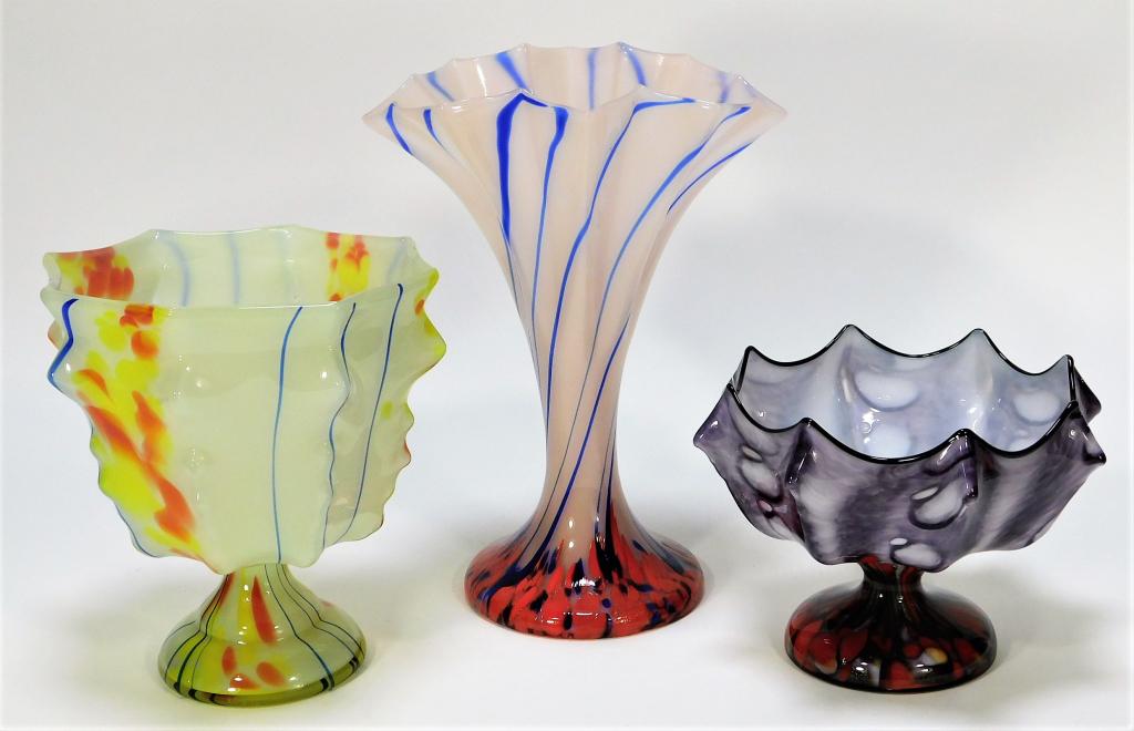 3 Bohemian Czech Art Glass Compote and Vase Group: Bohemia,Early 20th Century Includes one Welz compote with red confetti over purple, one Kralik compote with blue lines over orange and yellow confetti over white, and one Kralik frill vase with blue l