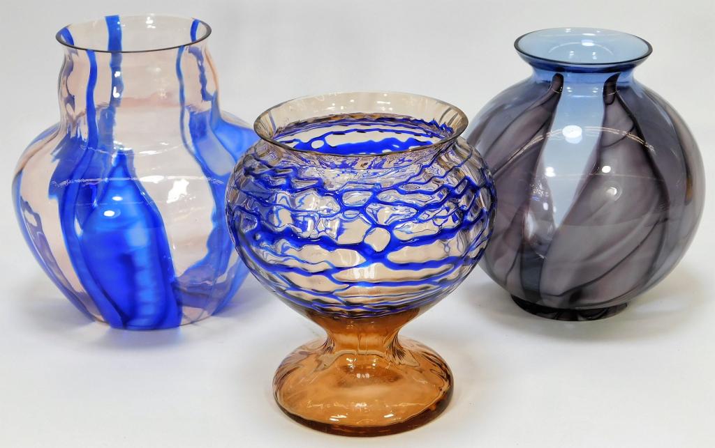 3 Kralik Bohemian Czech Lenora Art Glass Vases: Bohemia,Eaarly 20th Century Lot includes one purple over clear glass Lenora vase, one blue over clear Lenora vase, and one blue thread over clear glass vase. Glass,Smallest 6 1/2" x 5 1/4" dia.,Larges