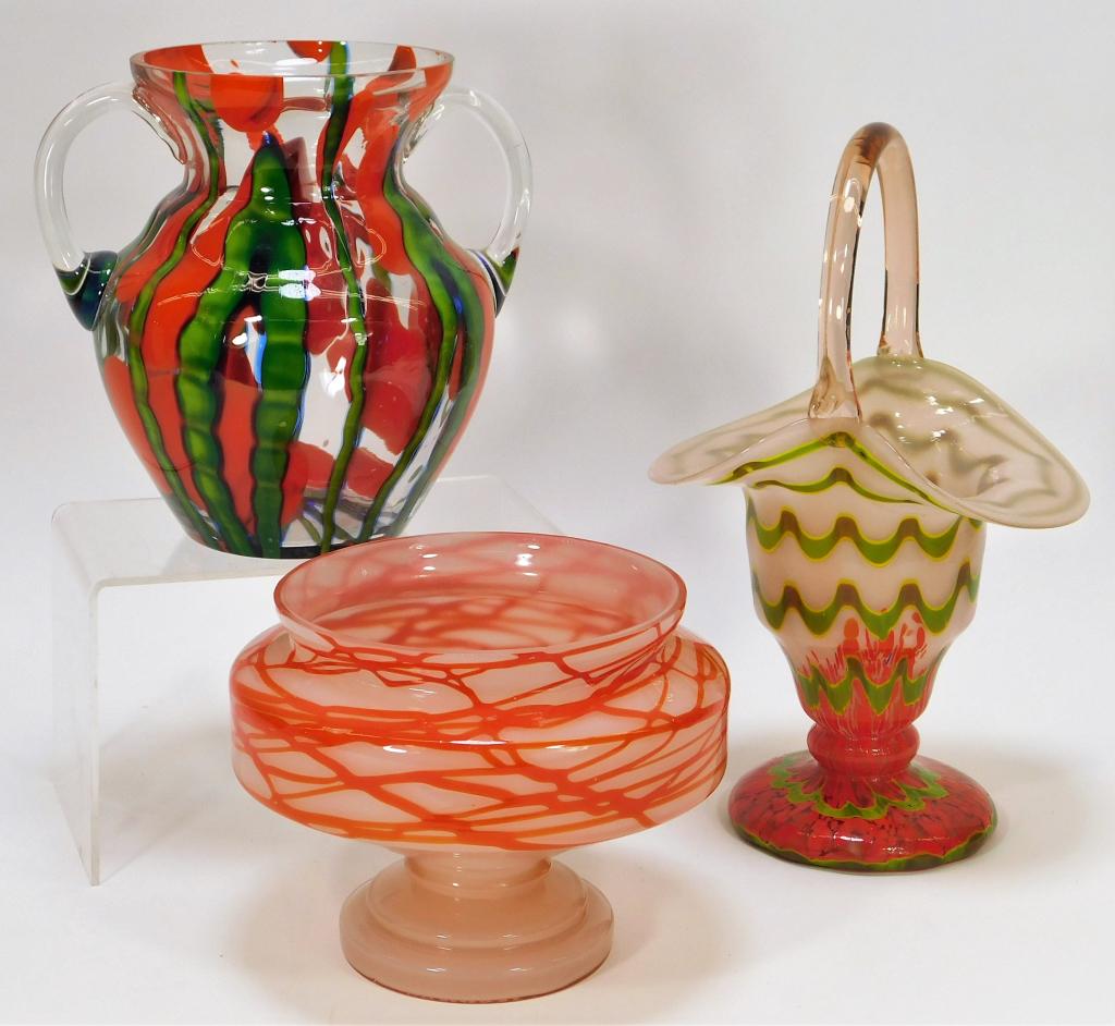 Kralik Bohemian Czech Art Glass Vase Compote Group: Bohemia,Early 20th Century Includes one handled vase with red and green Lenora pattern over clear, one basket vase with green waves over red confetti over white, and one compote with red threading ove