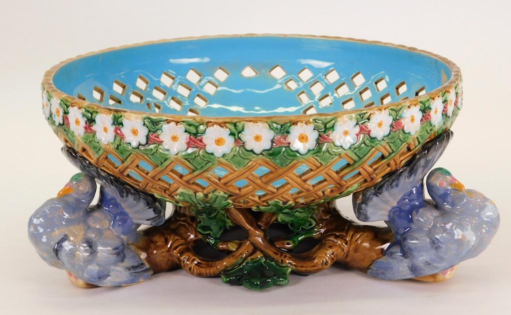 RARE Minton Majolica Turkey Basket Center Bowl: England,Late 19th Century Basket form center bowl decorated with a daisy chain around the rim perched on top of three figural stylized turkeys. Pottery,5 3/4" t x 12 1/2" dia., Marked "Minton" with nu
