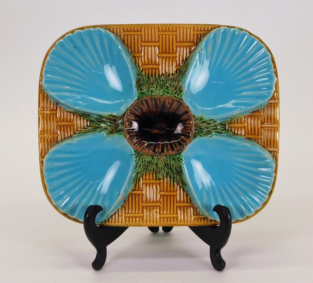 Minton Majolica Basket Four Well Oyster Plate: England,Late 19th Century Square plate with yellow basket texture and four turquoise oyster shell wells. Pottery,8 7/8" x 7 1/2", Marked "Mintons" with diamond impression with "R" in center and "3364"