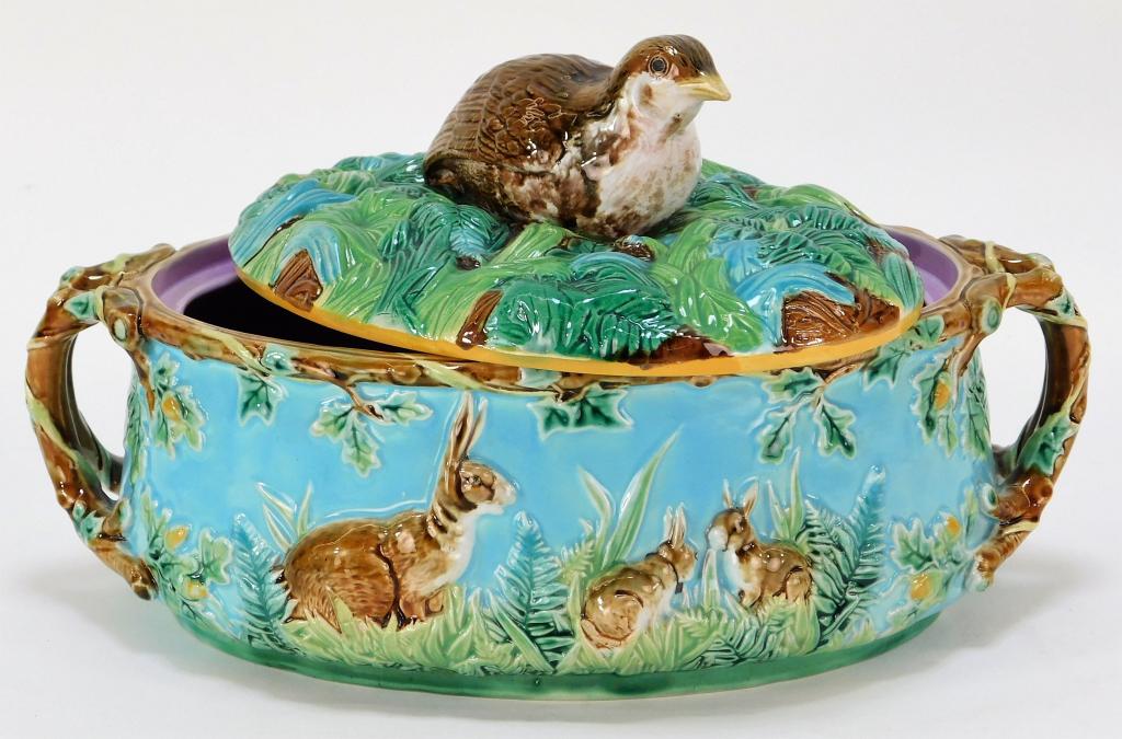 George Jones Majolica Partridge Tureen: England,Circa 1875 Figural nesting bird handle atop a leafy lid with rabbits and oak trees decorating the bowl against a pale blue ground. Pottery,7" t x 12 1/2" w x 8" d, Marked with makers mark on b