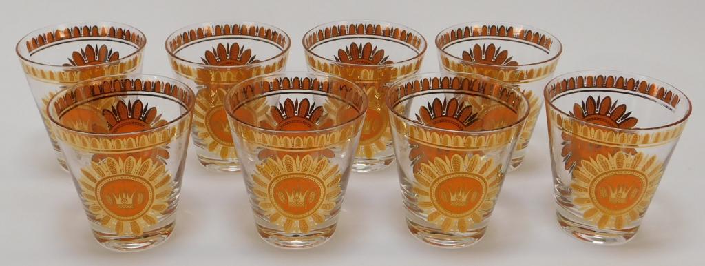 8 Georges Briard MCM Modern Art Glass Glasses: New York,1917-2005 Georges Briard Matching set of drinking glasses decorated with crown motifs within the center of flowers. Glass,4" x 4" dia., Everything marked "Georges Briard" next to designs. Fro