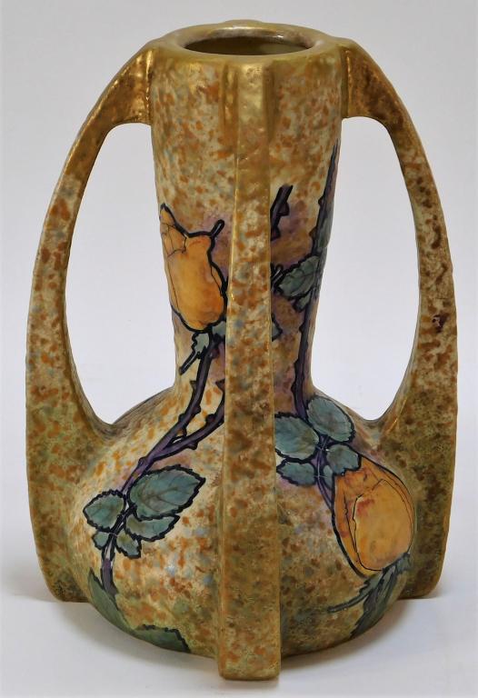 Austrian Art Nouveau Amphora Pottery Rose Vase: Austria,Circa 1920 Four handled vase decorated with yellow roses and thorns over a mottled gold and blue glaze. Pottery,11" x 7 1/2" dia., Marked "Austria Amphora" on bottom beneath a crown. From the 