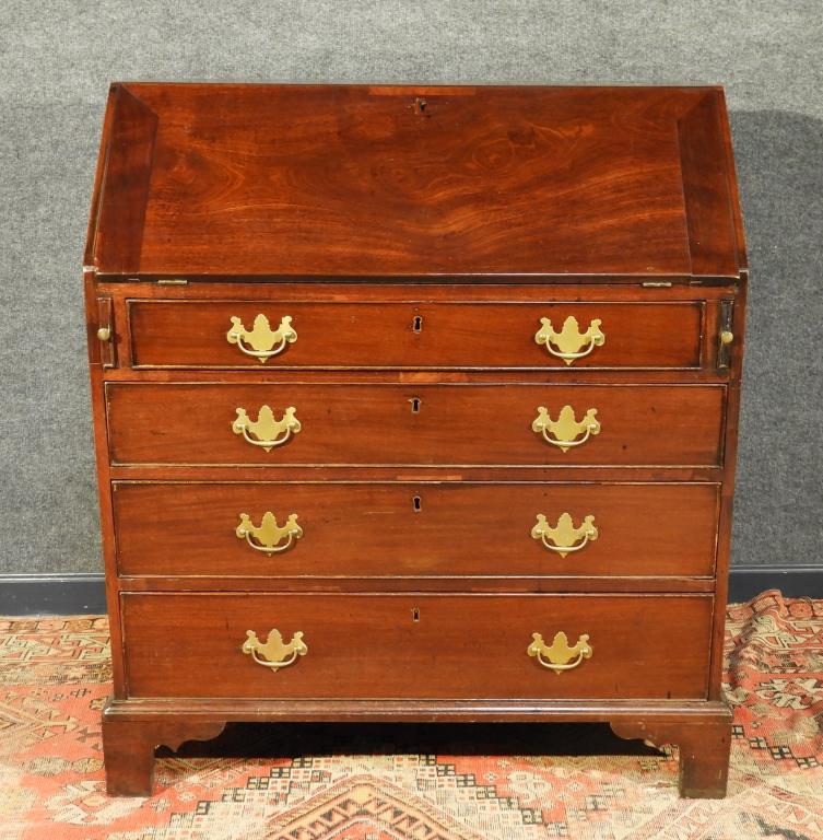 C.1800 English George III Slant Front Desk: England,Circa 1800 Slant top with fitted interior over four graduated drawers supported by a bracket base. Mahogany,41 1/2" x 36" x 20" deep, From the collection of a Newport, Rhode Island gentleman.