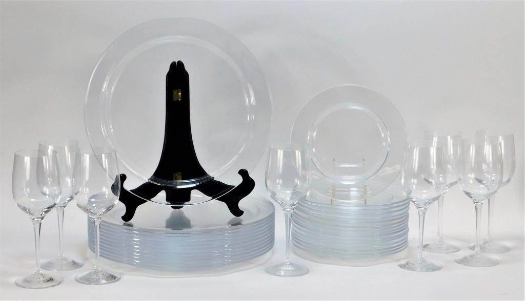 36PC Tiffany and Co. Clear Glass Dinnerware Set: United States,20th Century Includes twelve dinner plates, sixteen salad plates, and eight wine glasses with sleek modern design. Glass,Salad plate 8" dia.,Dinner plate 12 1/2" dia. All marked "Tiffany