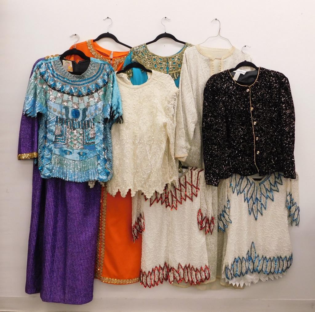 Vintage Beaded & Lace Theater Costumes Clothing: United States,20th Century Includes twenty-six costumes including dresses, elaborately beaded tops and jackets, white lace dresses, and thick brocades. Notice the one dress with googly eyed figure nea