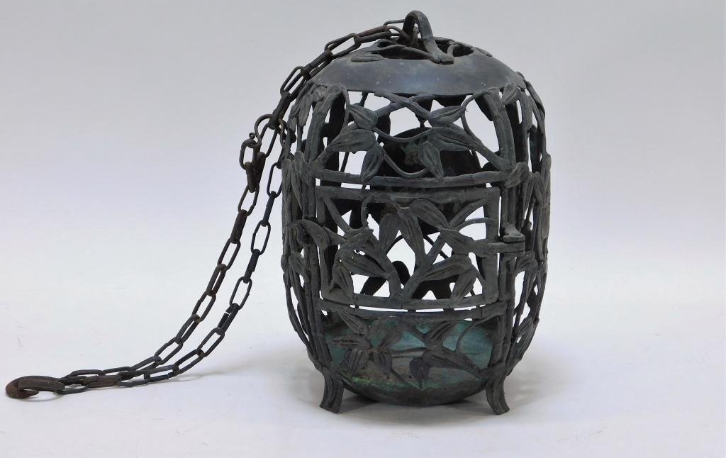 Japanese Meiji Period Bronze Bamboo Lantern: Japanese,Meiji Period Four footed lantern with pierced body decorated with stalks of bamboo and botanical medallions. Bronze,10 1/4" x 6 1/2" dia., From the collection of a North Scituate, Rhode Islan