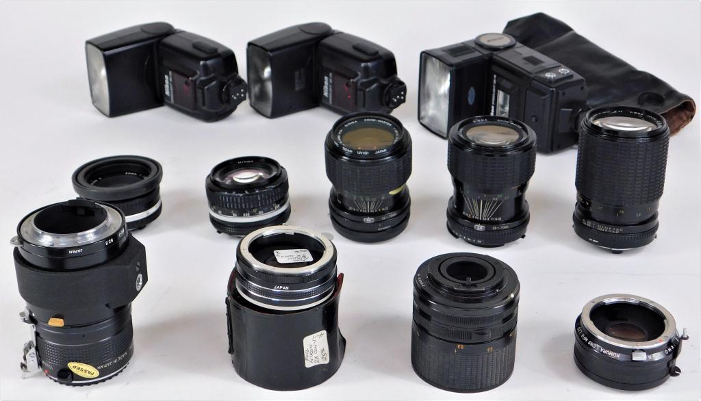 Group of Nikon Accessories: Group of Nikon accessories. Includes flashes, lenses, converters, and more as shown.