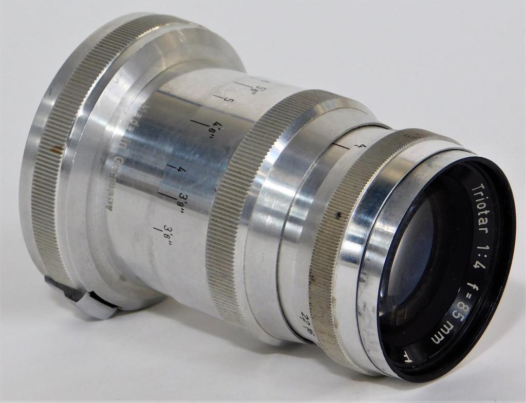 Zeiss Triotar Lens 85mm f/4, for Contax RF: Zeiss-Opton Triotar lens 85mm f/4, for Contax RF mount. Condition: Barrel shows signs of light wear and/or usage. Glass appears clean.