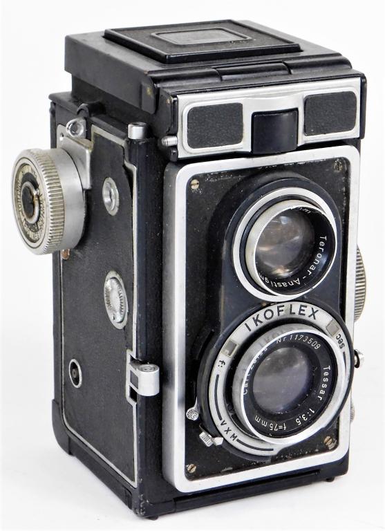 Zeiss Ikon Ikoflex Ic 886/16 TLR Camera #1: Zeiss Ikon Ikoflex Ic 886/16 TLR camera, for 120 roll film, 1956-1960. Condition: Signs of normal use or age. Barrel appears well used and may include dings, scrapes/scratches, moderate brassing. Sign