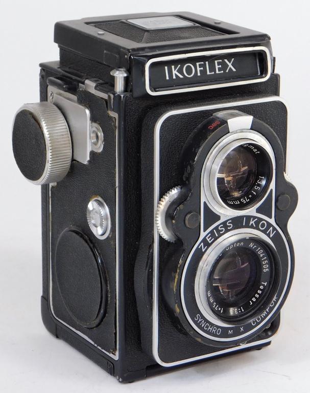 Zeiss Ikon Ikoflex II 851/16 TLR Camera: Zeiss Ikon Ikoflex II 851/16 TLR camera, for 120 roll film, 1936-1939. Condition: Signs of normal use or age. Barrel shows signs of light wear and/or usage. Glass appears clean.Includes 2 lenses. Tero