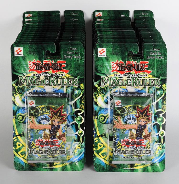 28PC 2002 YuGiOh Magic Ruler TCG Blister Pack Lot: United States,2002 Group includes twenty-eight 2002 Konami Yu-Gi-Oh! Magic Ruler trading card blister packs. All factory sealed and case fresh with minimal wear. Magic Ruler was quickly renamed to Spe