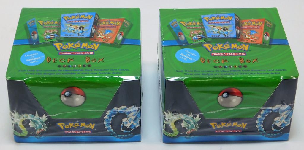 2PC 1999 WOTC Pokemon Factory Sealed Deck Box: United States,1999 Group includes two 1999 Wizards of the Coast Pokemon Deck Box, each factory sealed with minimal shelf wear and intact cellophane wrap.,Each 4" x 6" x 6" Domestic shipping to the con