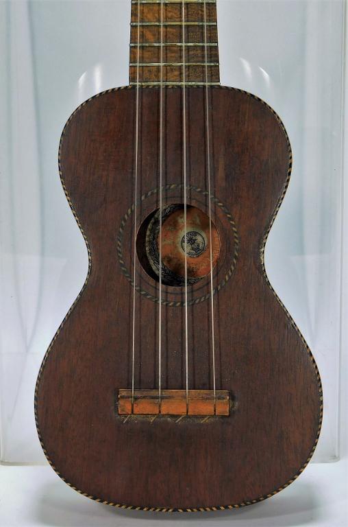 Bruno Lyra Hawaiian Soprano Ukulele: United States,20th Century Distributed by Bruno, a New York based company, features a nice rope binding, Hawaiian style fingerboard, and wide neck with a 3 3/4" center bout. Overall 20 3/4" x 6",Body 