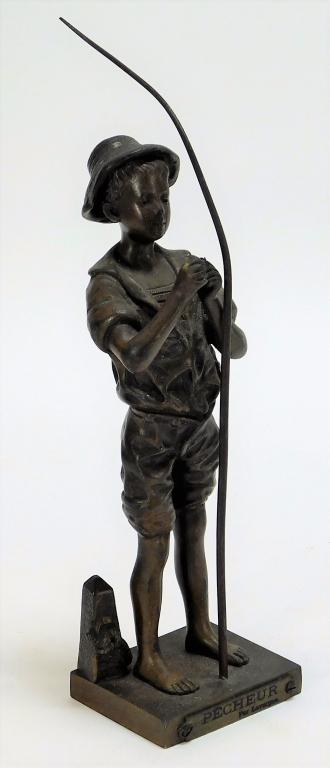 Aft. Adolphe Jean Lavergne Fisher Boy Statue: France,1852 - 1901 Depicts a naturalistic boy in a hat untangling fishing line beside an obelisk shaped boat tie. 8 1/2" t x 2 1/4" w x 2" d,, Bronze Base signed "Lavergne" beside left foot, plaque ma