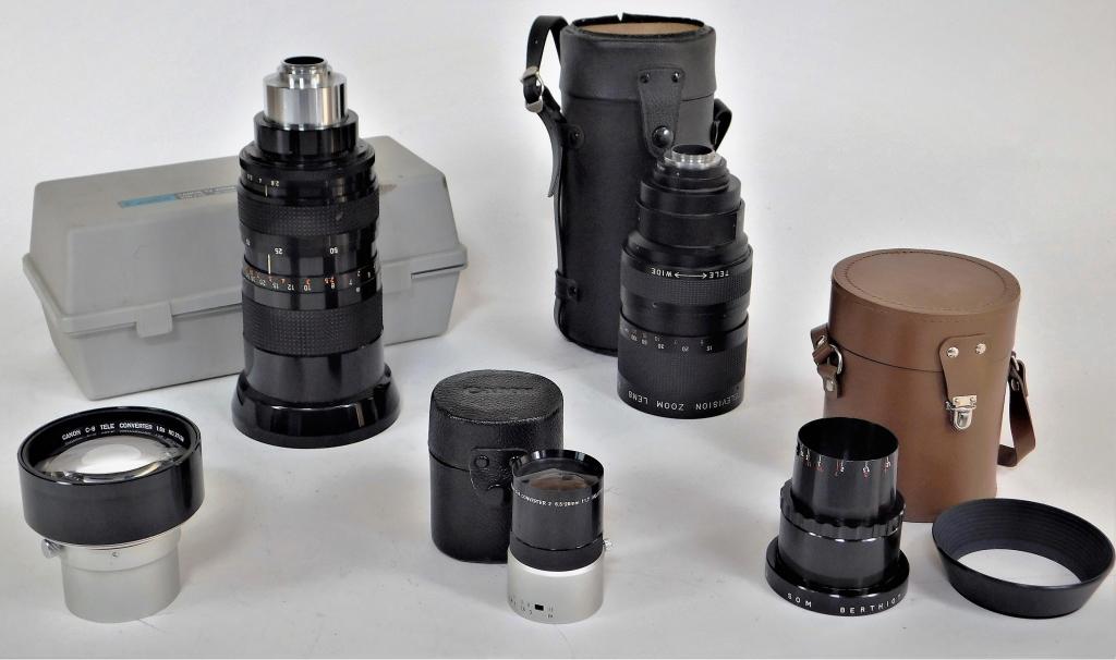 Lot of 5 Television Lenses and Converters: Lot of 5 Television lenses and converters. Includes Canon Zoom V10x15 15-150mm f/2.8 with case, Cosmicar Zoom 22-66mm f/1.8 with case, SOM Berthiot Hyper Pan wide angle with case, Canon C-8 Teleconver